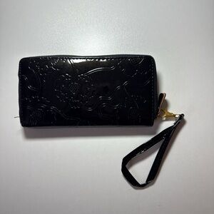 Elegant Black Embossed Wallet with Strap